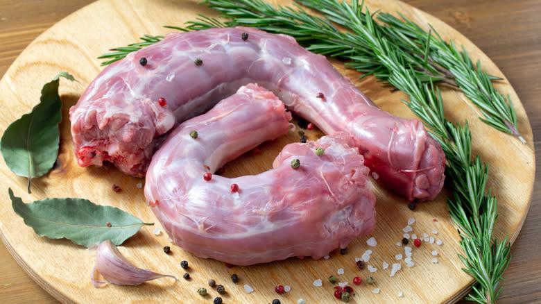 Raw turkey necks with spices and herbs