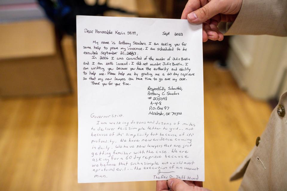 A letter from death row inmate Anthony Sanchez to Gov. Kevin Stitt is shown at a meeting held by death penalty opponents at First Unitarian Church in Oklahoma City Tuesday.