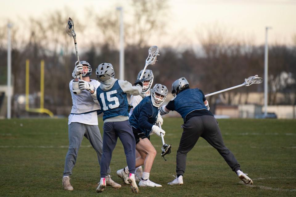 CR North students attend boys lacrosse tryouts at Council Rock North High School on Wednesday, March 8, 2023. High schools spring sports officially kick off late March in Bucks County.