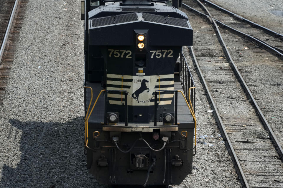 FILE - Norfolk Southern locomotives are moved in Norfolk Southern's Conway Terminal in Conway, Pa., June 17, 2023. Lawyers and unions who represent rail workers say there is a clear pattern across the industry of railroads retaliating against workers who report safety violations or injuries on the job. (AP Photo/Gene J. Puskar, File)