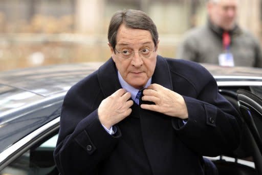 Cypriot President Nicos Anastasiades arrives at the EU headquarters in Brussels, on March 15, 2013. Anastasiades on Saturday tried to appease Cypriots angry at having to pay up from their bank deposits for part of an EU bailout deal which his government signed to rescue the island's banks