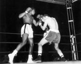 Cassius Clay (L), (later Muhammad Ali) fights Henry Cooper at Wembley Stadium in London, Britain June 18, 1963Mandatory Credit: Action Images / MSI/File Photo