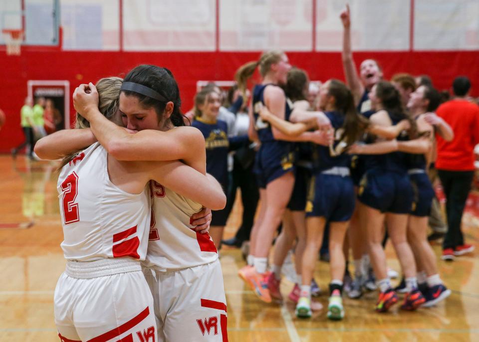 Wisconsin Rapids Lincoln High School's Meghan Jochimsen (2) and Chelsea King (42) embrace after losing a game against Wausau West High School on Thursday, February 17, 2022, at Wisconsin Rapids Lincoln High School in Wisconsin Rapids, Wis. Wausau West won the game, 67-51, to clinch the Wisconsin Valley Conference championship.