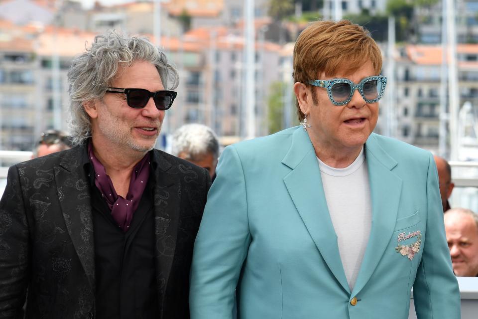 Director Dexter Fletcher (left) enjoyed working with Elton John on the biopic "Rocketman." "He can address questions that people might have about its authenticity."