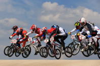 Jelle Van Gorkom (2L) of the Netherlands clears the jump with the pack during the Men's BMX Cycling Quarter Finals on Day 13 of the London 2012 Olympic Games at BMX Track on August 9, 2012 in London, England. (Photo by Phil Walter/Getty Images)