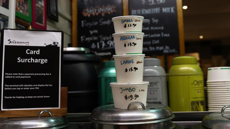 Soup bowls on a shop counter.