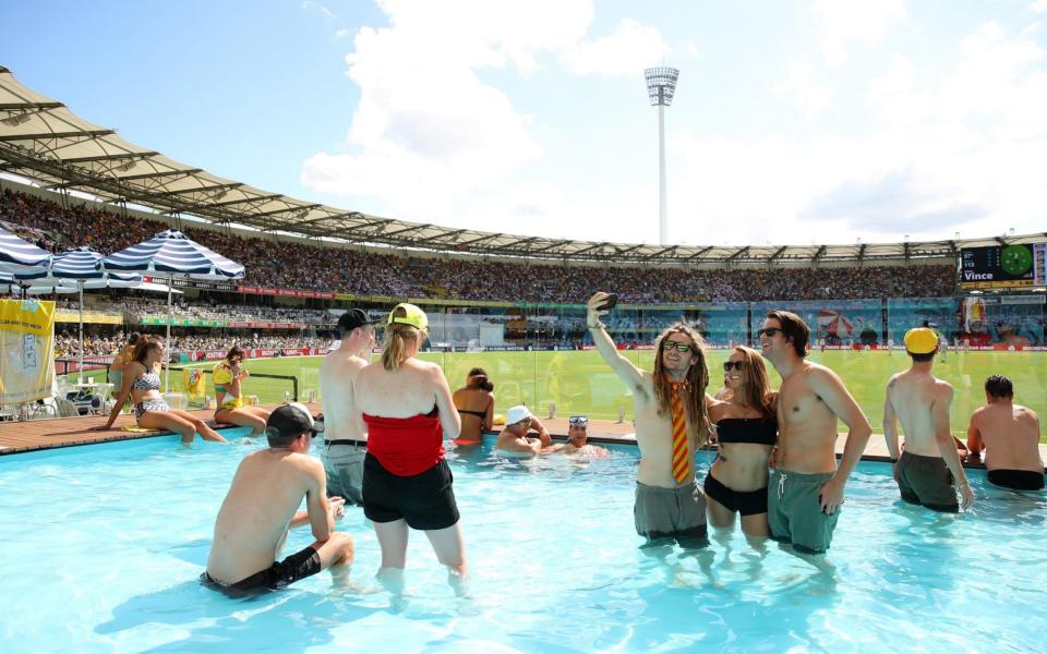  Fans cool off in the pool at the Gabba Pool Deck during day one of the First Test Match of the 2017/18 Ashes Series between Australia and England at The Gabba on November 23, 2017 in Brisbane, Australia - Cameron Spencer/Getty Images