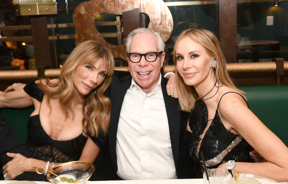 LAS VEGAS, NEVADA - DECEMBER 13: (L-R) Jennifer Flavin, Tommy Hilfiger, and Dee Ocleppo attend the Fontainebleau Las Vegas Star-Studded Grand Opening Celebration on December 13, 2023 in Las Vegas, Nevada. (Photo by Bryan Steffy/Getty Images for Fontainebleau Las Vegas)