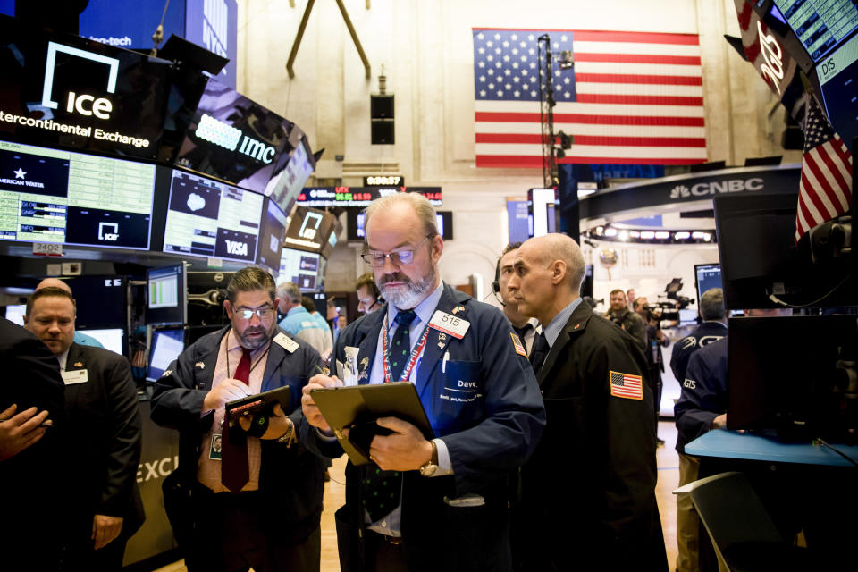 NEW YORK, March 16, 2020 -- Traders work on the floor at the New York Stock Exchange in New York, the United States, March 16, 2020. U.S. stocks opened sharply lower on Monday even after the Federal Reserve cut its benchmark interest rate to the range from 0 to 0.25 percent and unveiled a huge program of bond-buying amid coronavirus fallout.     The S&P 500 index declined 8 percent shortly after the opening bell, triggering a key circuit breaker that halted trading for 15 minutes. It was the third time that the circuit breakers, or trading halts, have been tipped since last week. (Photo by Michael Nagle/Xinhua via Getty) (Xinhua/Michael Nagle via Getty Images)