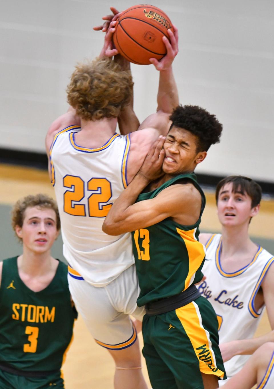 Hudson Omoke of Sauk Rapids collides with Johnathon O'Brien of Big Lake during the first half of the game Tuesday, Dec. 7, 2021, at Sauk Rapids-Rice High School.