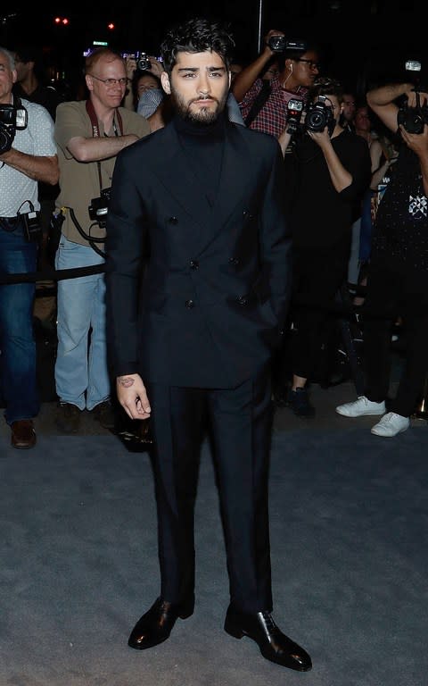 Zayn Malik in a Tom Ford polo neck and blazer  - Credit: Getty Images 