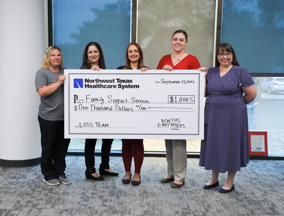 Northwest Texas Healthcare System presented the Family Support Services LOSS (Local Outreach for Survivors of Suicide) team with a $1,000 donation.