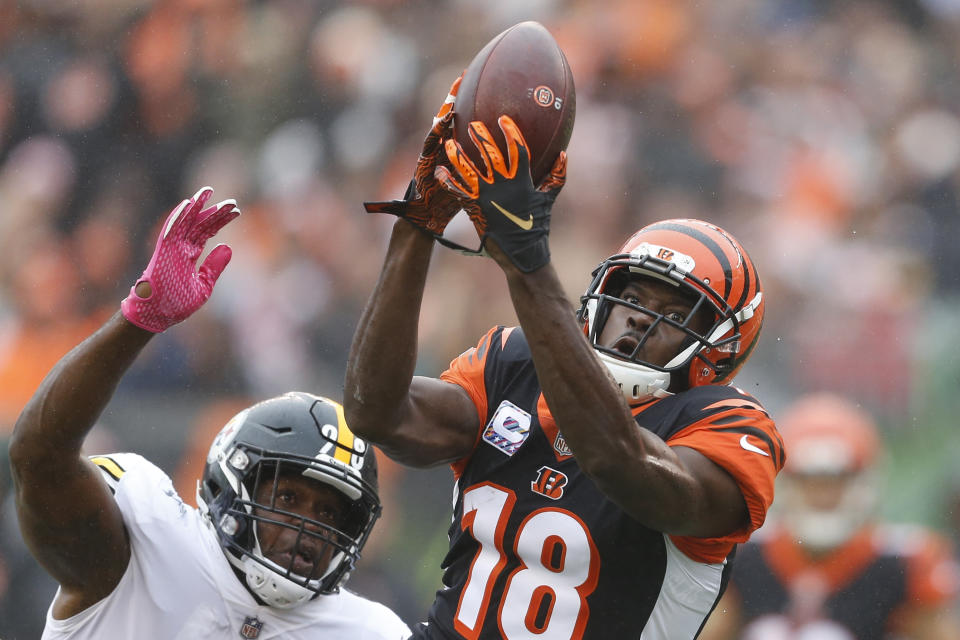 Cincinnati Bengals wide receiver A.J. Green (18) caches a pass in the first half of an NFL football game against the Pittsburgh Steelers, Sunday, Oct. 14, 2018, in Cincinnati. (AP Photo/Gary Landers)