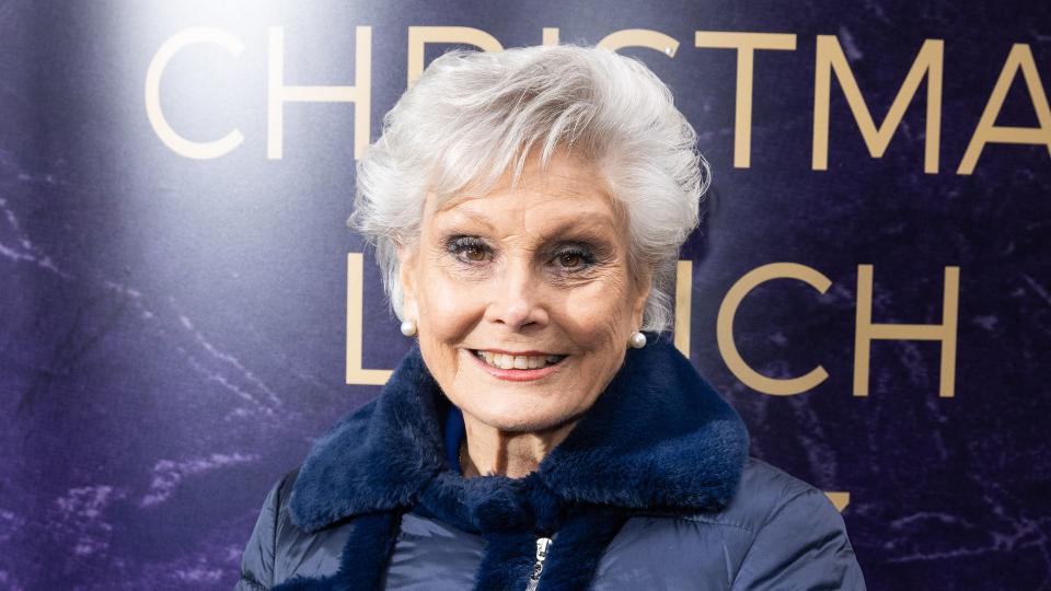 Angela Rippon in a blue coat