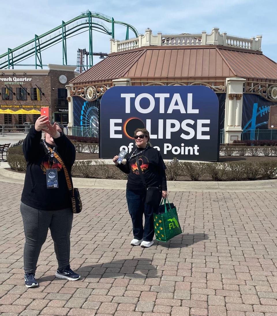 Abby Feldman takes a selfie with her mother Helen at Cedar Point on Monday. They traveled from Celebration, Florida, to take in the total eclipse.