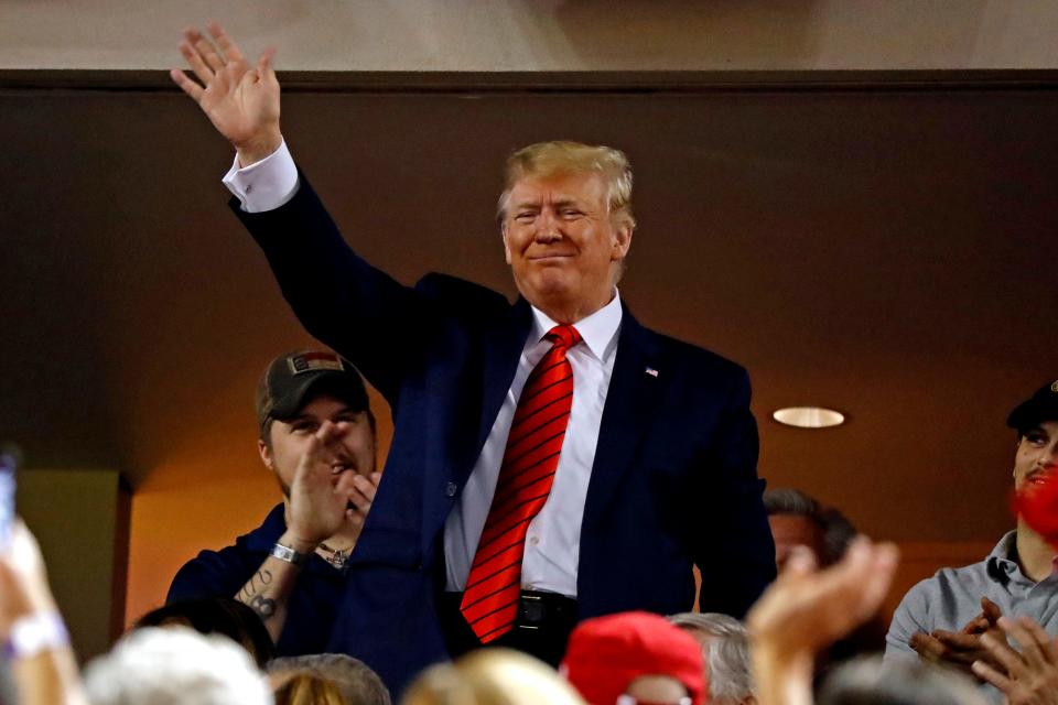 Trump waves during Game 5 of the 2019 World Series at Nationals Park in Washington D.C.