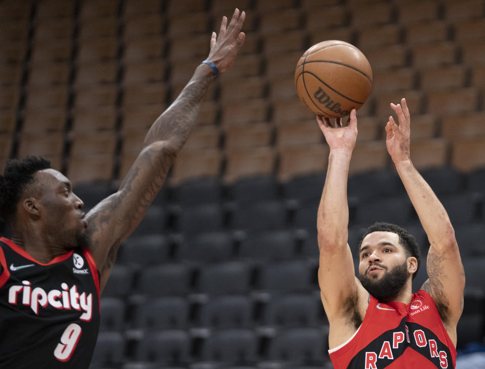 Toronto Raptors guard Fred VanVleet (23) shoots as Portland Trail Blazers forward Nassir Little (9) defends during first-half NBA basketball game action in Toronto, Sunday Jan. 23, 2022. (Frank Gunn/The Canadian Press via AP)