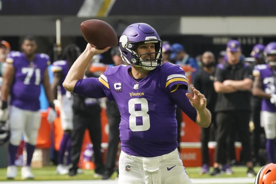 Minnesota Vikings quarterback Kirk Cousins (8) throws a pass.