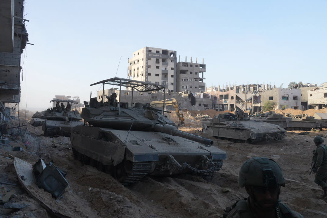 Israeli troops in tanks search for Hamas militants in northern Gaza.