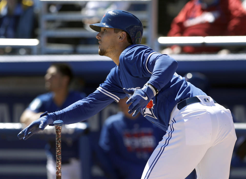 Toronto Blue Jays' Cavan Biggio watches his home run off Philadelphia Phillies starting pitcher Vince Valasquez during the second inning of a spring training baseball game Wednesday, March 6, 2019, in Dunedin, Fla. (AP Photo/Chris O'Meara)