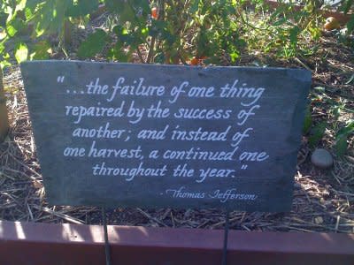 A slate marker with a quote from Thomas Jefferson decorates a bed planted with seeds he first grew at Monticello. (Photo: Lylah M. Alphonse/Yahoo! Shine)