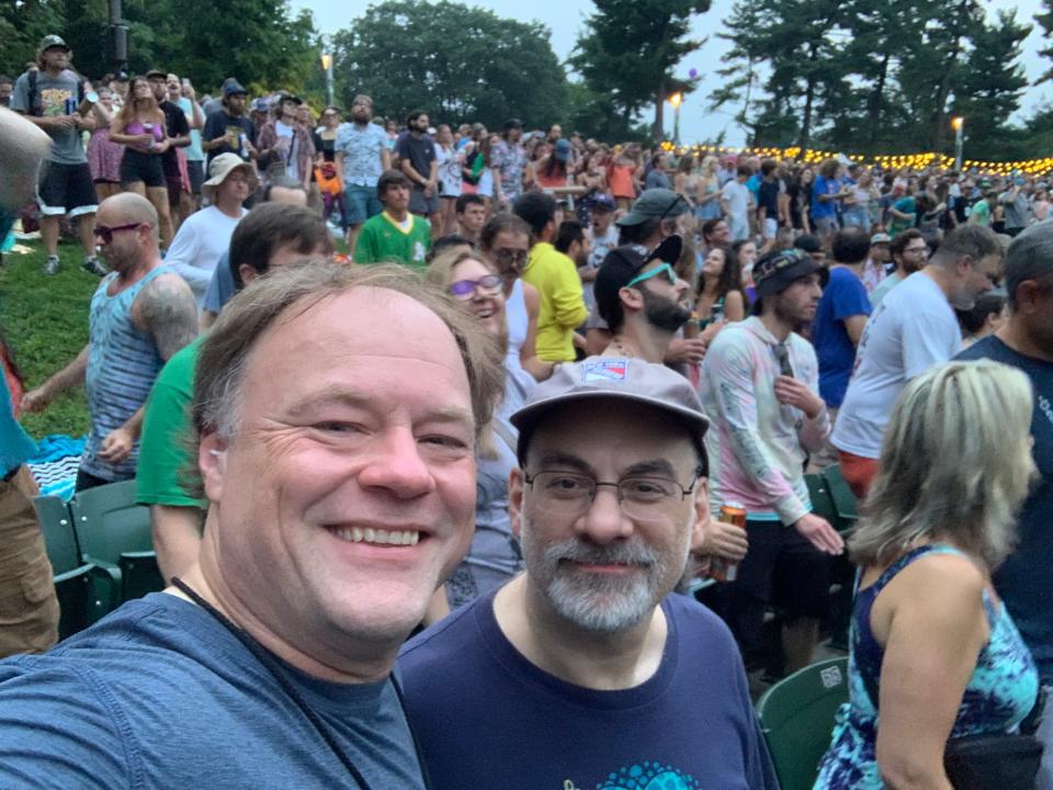 Wilmington resident Matt Urban (left) has attended 180 Phish performances since 1992.