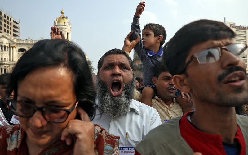 A demonstrator shouts slogans during a protest against the Citizenship Amendment Bill, in Kolkata