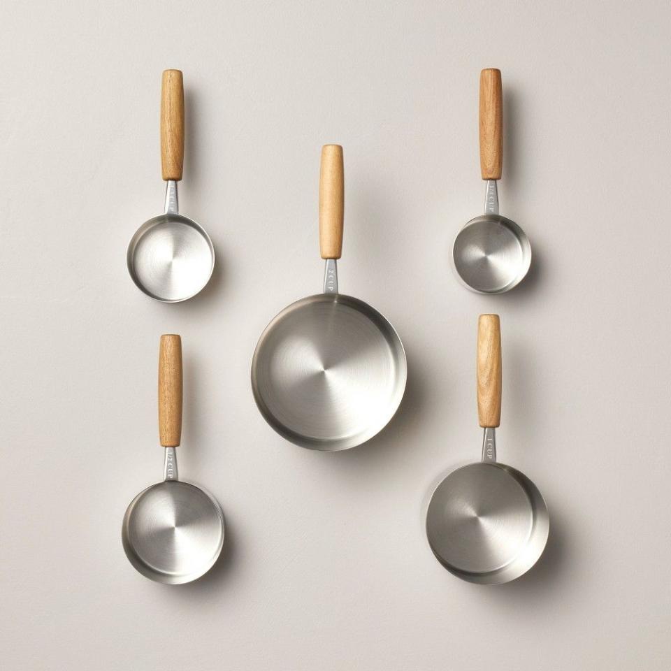 <p><a href="https://go.redirectingat.com?id=74968X1596630&url=https%3A%2F%2Fwww.target.com%2Fp%2F5pc-wood-38-stainless-steel-measuring-cups-hearth-38-hand-8482-with-magnolia%2F-%2FA-88503333&sref=https%3A%2F%2Fwww.housebeautiful.com%2Fshopping%2Fbest-stores%2Fa60638169%2Fjoanna-gaines-kitchenaid-stand-mixer-target-sale%2F" rel="nofollow noopener" target="_blank" data-ylk="slk:Shop Now;elm:context_link;itc:0;sec:content-canvas" class="link ">Shop Now</a></p><p>5-Piece Wood & Stainless Steel Measuring Cups</p><p>target.com</p><p>$16.99</p>