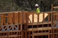 FILE PHOTO: A construction worker on the job at a residential project during the outbreak of the coronavirus disease in California