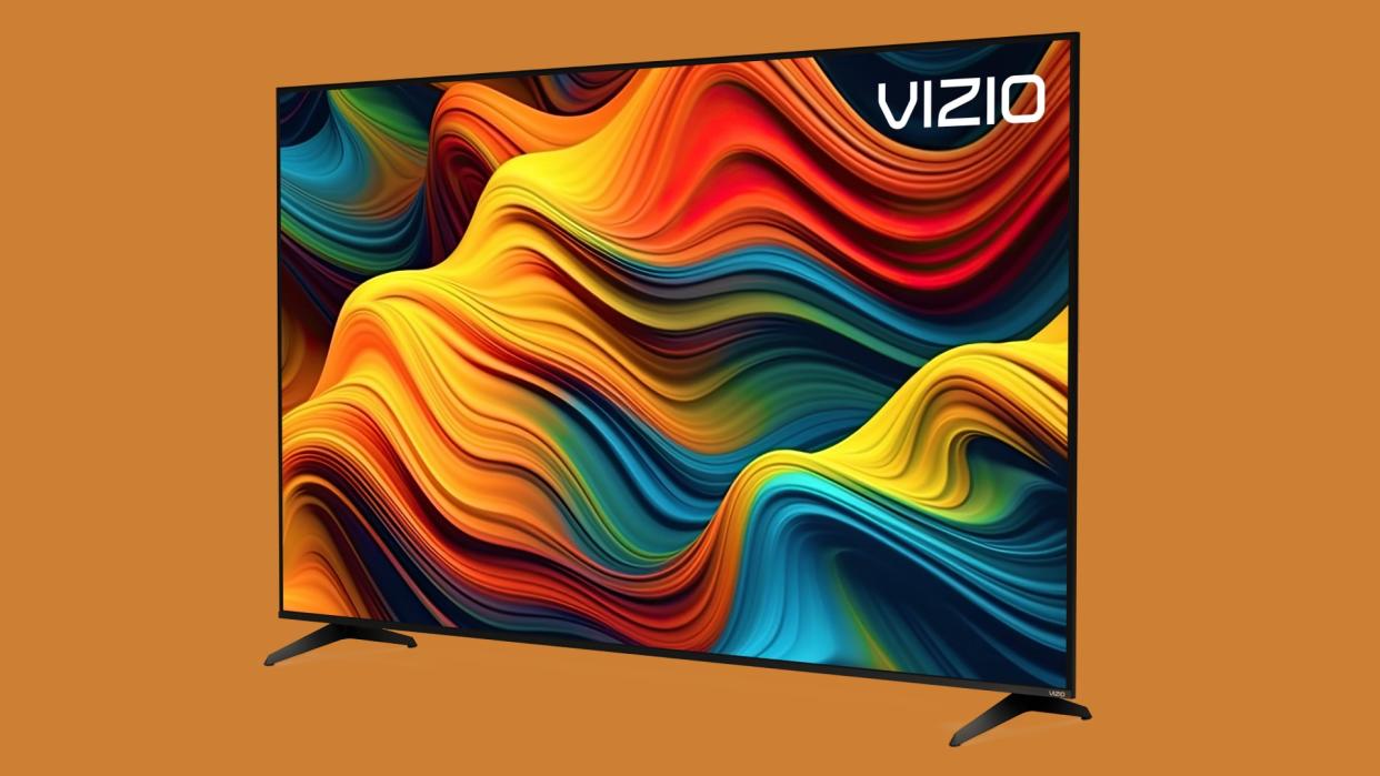  Vizio 86-inch 4K TV on orange background. 