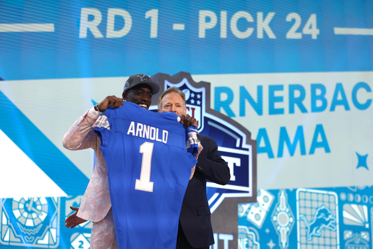 DETROIT, MICHIGAN - APRIL 25: (L-R) Terrion Arnold poses with NFL Commissioner Roger Goodell after being selected 24th overall by the Detroit Lions during the first round of the 2024 NFL Draft at Campus Martius Park and Hart Plaza on April 25, 2024 in Detroit, Michigan. (Photo by Gregory Shamus/Getty Images)