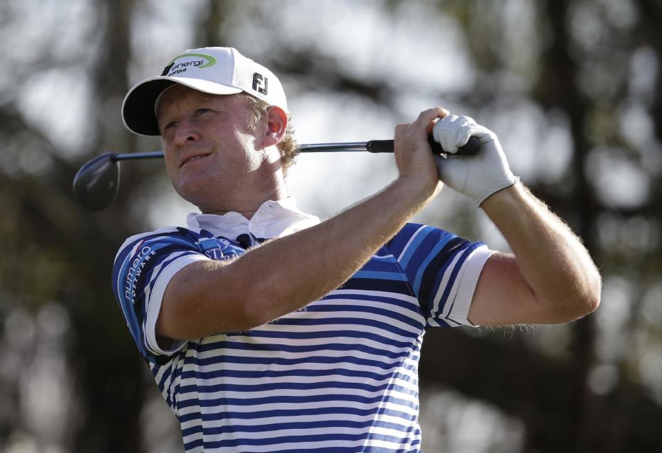 Jamie Donaldson watches his shot from the fifth tee during the second round of the Cadillac Championship golf tournament Friday, March 7, 2014, in Doral, Fla. (AP Photo/Lynne Sladky)