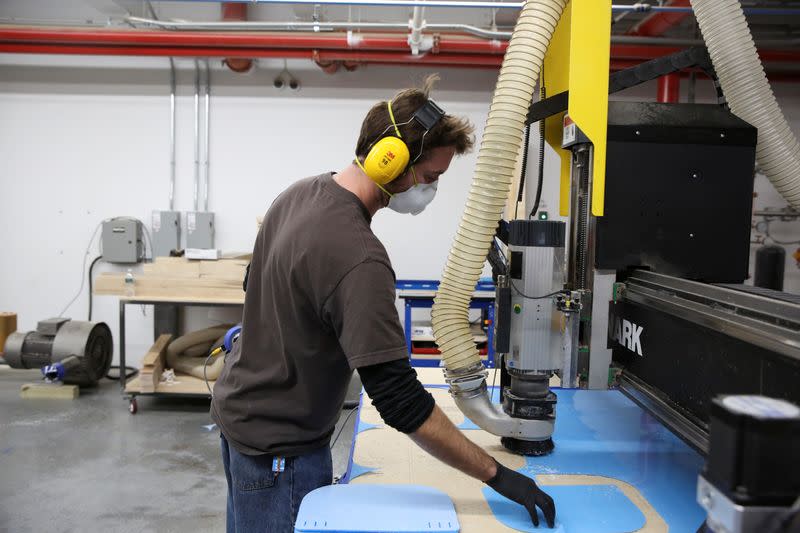 Workers at Bednark produce medical face shields, as the demand for their production rapidly increased