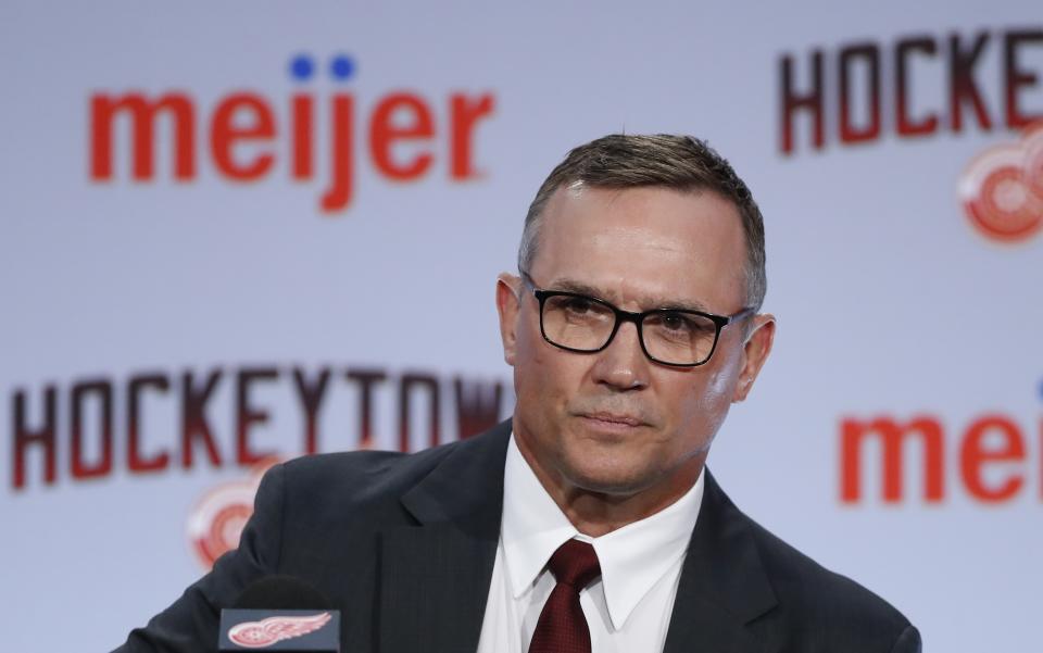 File- This April 19, 2019, file photo shows Steve Yzerman being introduced as the new executive vice president and general manager of the Detroit Red Wings during a news conference, in Detroit. The Red Wings are sticking with coach Jeff Blashill for their rebuild. Yzerman made the announcement Tuesday, May 18, 2021, giving Blashill a contract extension despite a five-year postseason drought and a career record of 172-221-62. (AP Photo/Carlos Osorio, File)