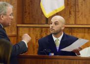 Prosecutor Patrick Bomberg questions witness and private forensic examiner, Eric Carita, about the bubble gum found in the Nissan Altima during the murder trial of former New England Patriots tight end Aaron Hernandez at Bristol County Superior Court in Fall River, Massachusetts, April 6, 2015. REUTERS/Ted Fitzgerald/Pool