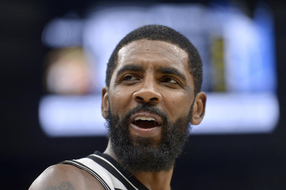 FILE - Brooklyn Nets guard Kyrie Irving reacts in the second half of an NBA basketball game against the Memphis Grizzlies on Monday, Oct. 24, 2022, in Memphis, Tenn. The Nets suspended Kyrie Irving for at least five games without pay Thursday, Nov. 3, 2022, dismayed by his repeated failure to “unequivocally say he has no antisemitic beliefs.”(AP Photo/Brandon Dill, File)