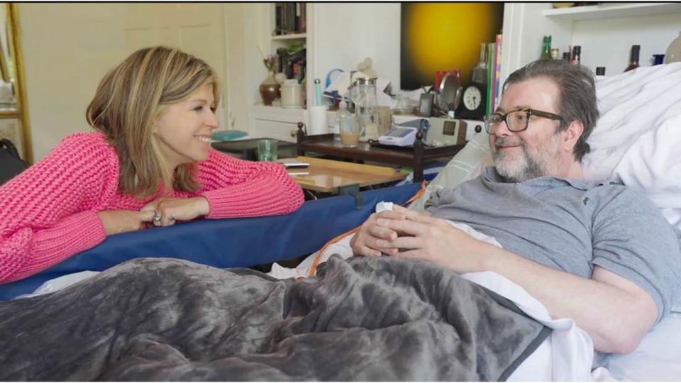 Kate Garraway sitting at Derek Draper's bedside as they chat