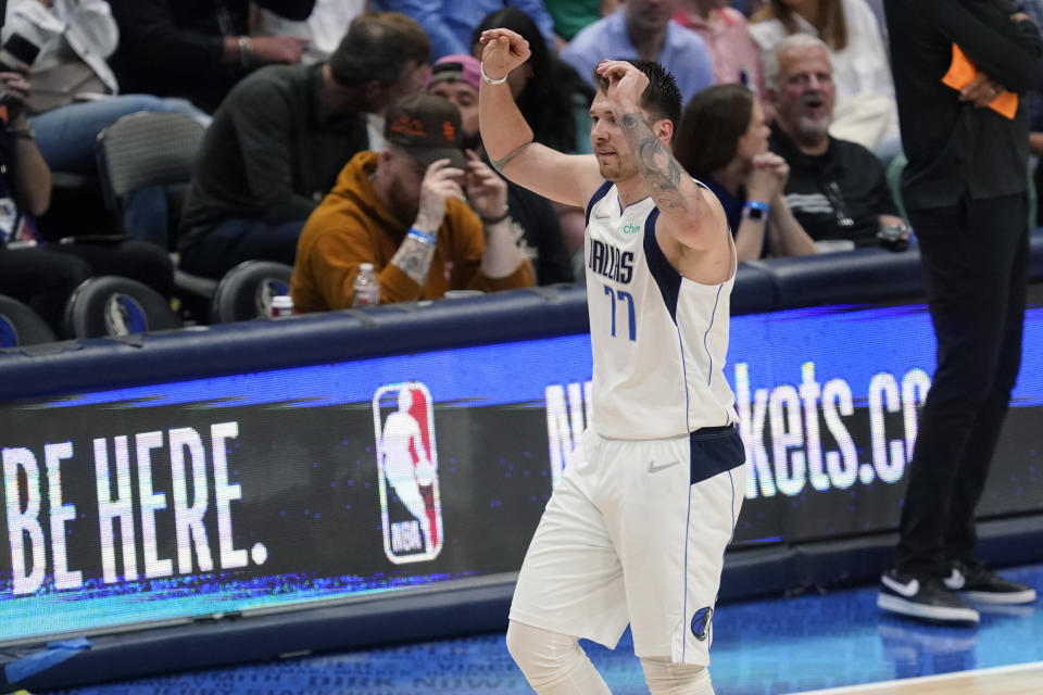 Dallas Mavericks guard Luka Doncic (77) walks off the court after he was called for a foul during the second half of Game 3 of an NBA basketball second-round playoff series against the Phoenix Suns, Friday, May 6, 2022, in Dallas. (AP Photo/Tony Gutierrez)