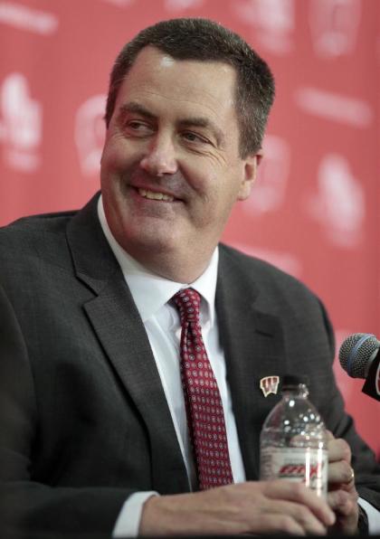 Paul Chryst, Wisconsin&#39;s new football coach, glances over at his new players during an a NCAA college football news conference at the Nicholas-Johnson Pavilion in Madison, Wis., Wednesday, Dec. 17, 2014. (AP Photo/Wisconsin State Journal, M.P. King)