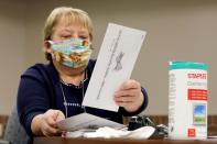 FILE PHOTO: FILE PHOTO: Absentee ballots are counted during the presidential primary election in Wisconsin