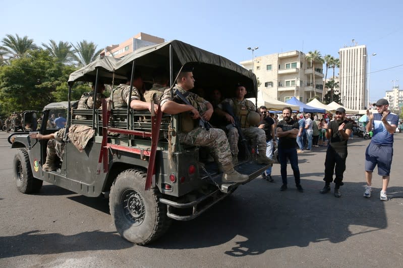 Lebanese army soldiers deploy during a protest targeting the government over an economic crisis in the port city of Sidon