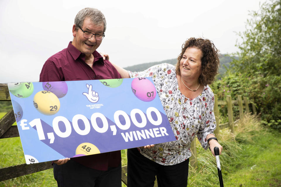 David and Shelley Adams celebrate their £1million win after a year of setbacks (SWNS)