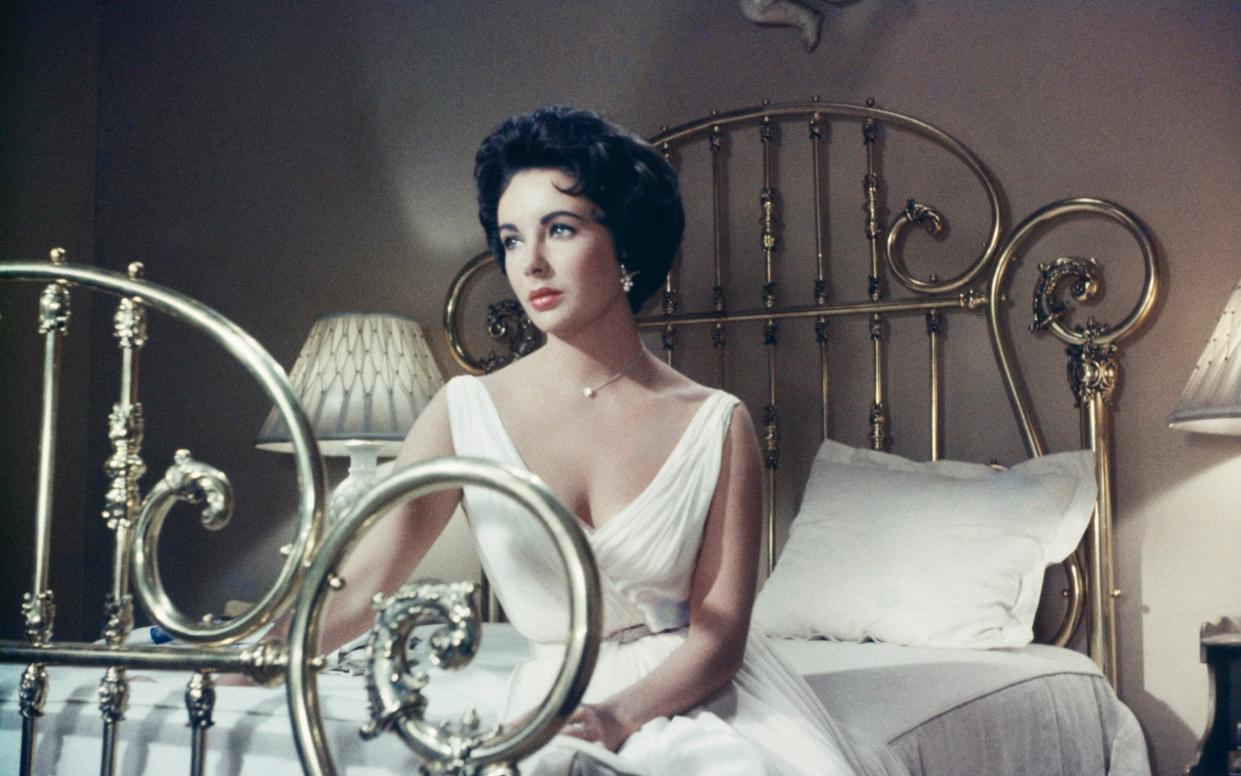 Elizabeth Taylor in Cat on a Hot Tin Roof (1958) - Archive Photos/Moviepix