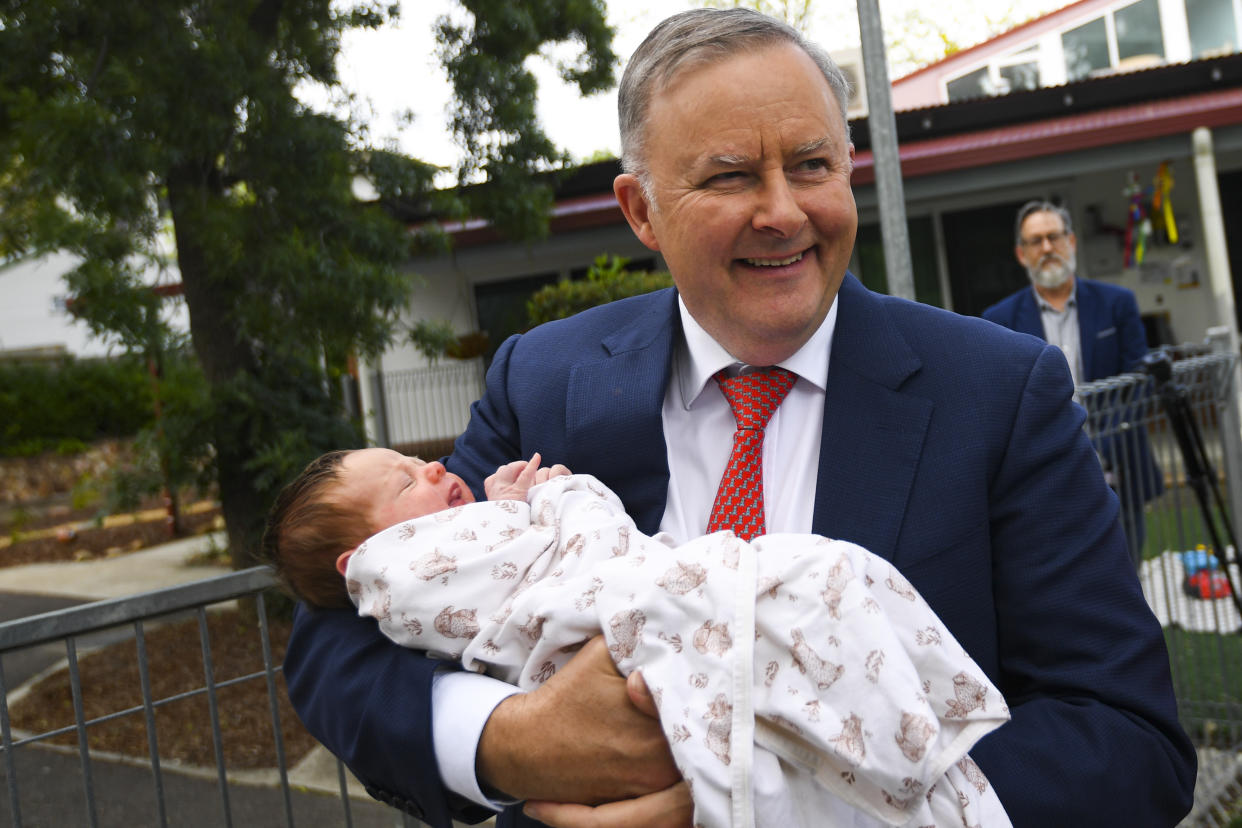 An elected Labor government would spend $6.2 billion over four years overhauling child care including scrapping the annual childcare subsidy cap. (AAP Image/Lukas Coch) 