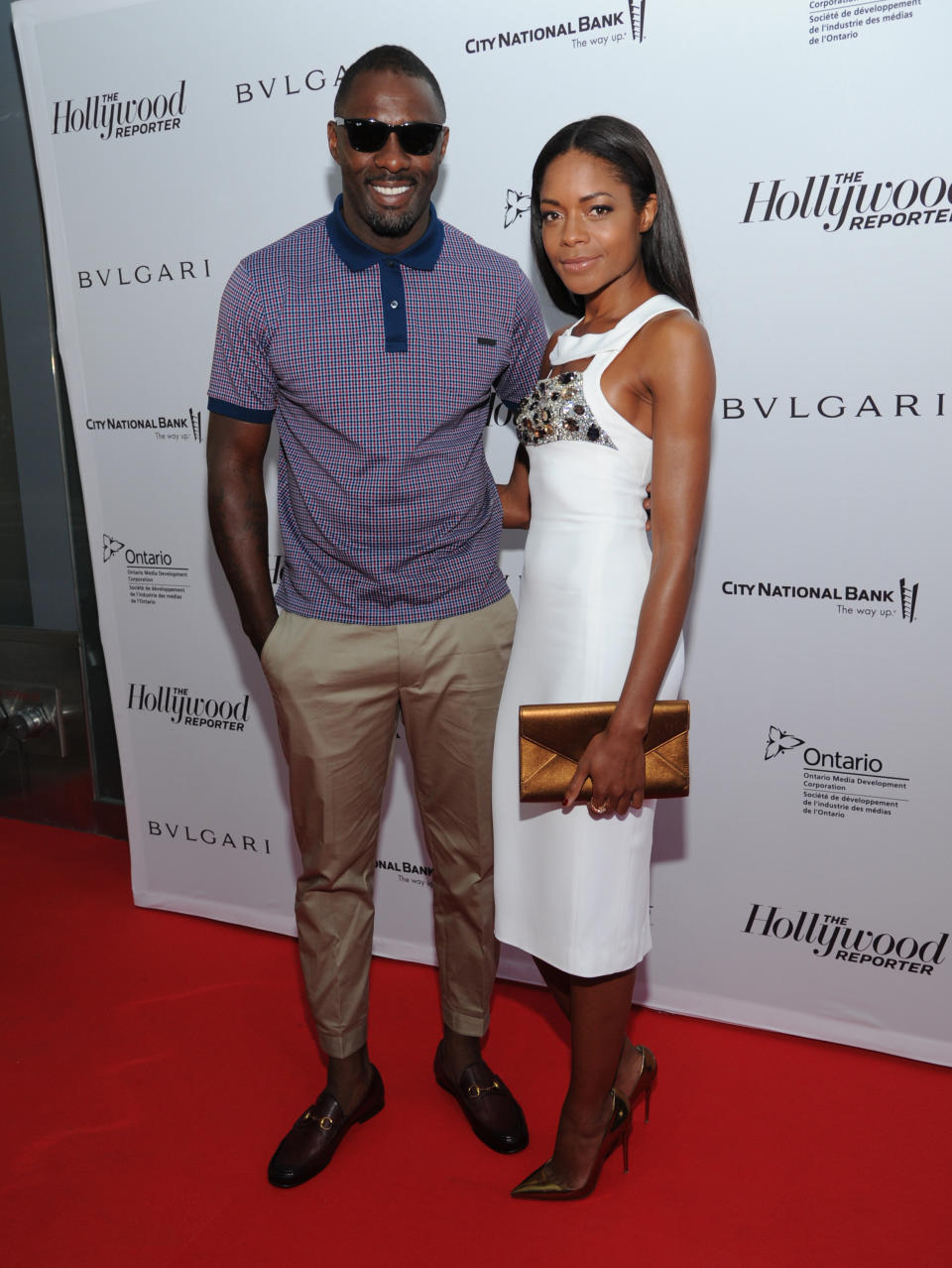 IMAGE DISTRIBUTED FOR THR - Idris Elba, left, and Naomie Harris arrive at The Hollywood Reporter's 2013 TIFF Cocktail Reception presented by Bulgari on Sunday, September 8, 2013 in Toronto. (Photo by Evan Agostini/Invision for THR/AP Images)