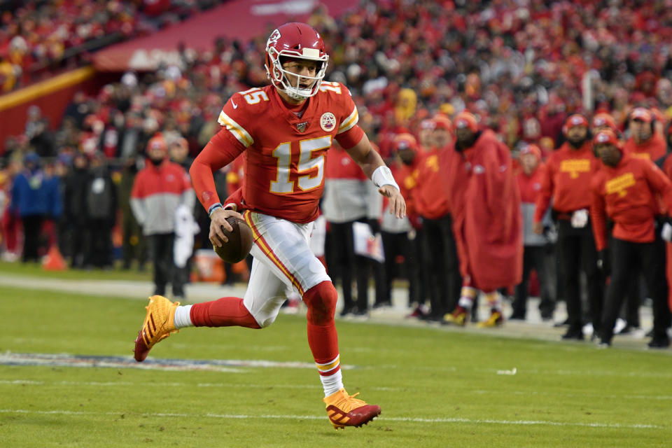 Kansas City Chiefs quarterback Patrick Mahomes (15) runs for a touchdown during the first half of an NFL football game against the Oakland Raiders in Kansas City, Mo., Sunday, Dec. 1, 2019. (AP Photo/Ed Zurga)