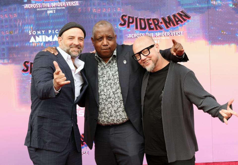 LOS ANGELES, CALIFORNIA - MAY 30: (L-R) Joaquim Dos Santos, Kemp Powers and Justin K. Thompson attend the world premiere of "Spider-Man: Across The Spider-Verse" at Regency Village Theatre on May 30, 2023 in Los Angeles, California. (Photo by Monica Schipper/Getty Images)