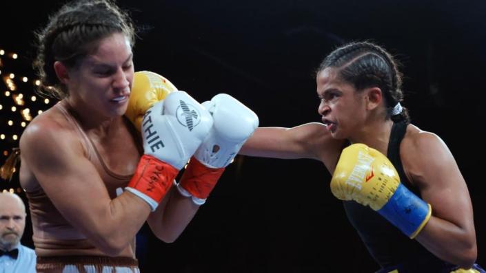 Ramla Ali (R) socks at punch to ace of Australian boxer Avril Mathie in New York, the US - Saturday 4 February 2032