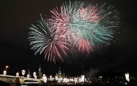 Fireworks light the sky in Moscow - Credit: TATYANA MAKEYEVA/REUTERS