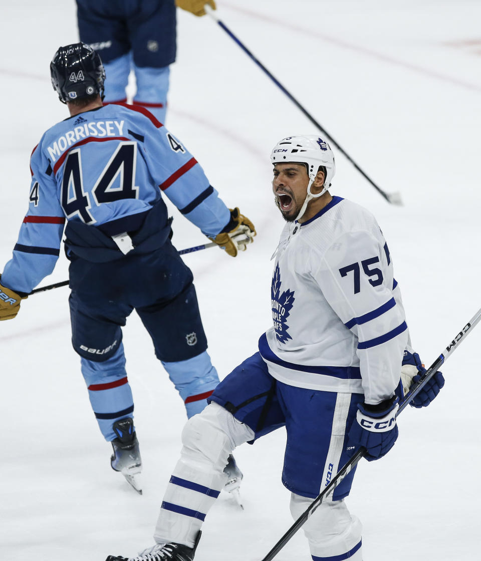 Toronto Maple Leafs' Ryan Reaves (75) celebrates his goal against the Winnipeg Jets during the first period of an NHL hockey game, Saturday, Jan. 27, 2024, in Winnipeg, Manitoba. (John Woods/The Canadian Press via AP)